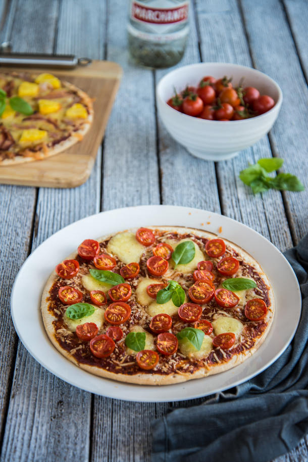 Cherry Tomato Mozzarella and Fresh Basil Pizza The Hungry