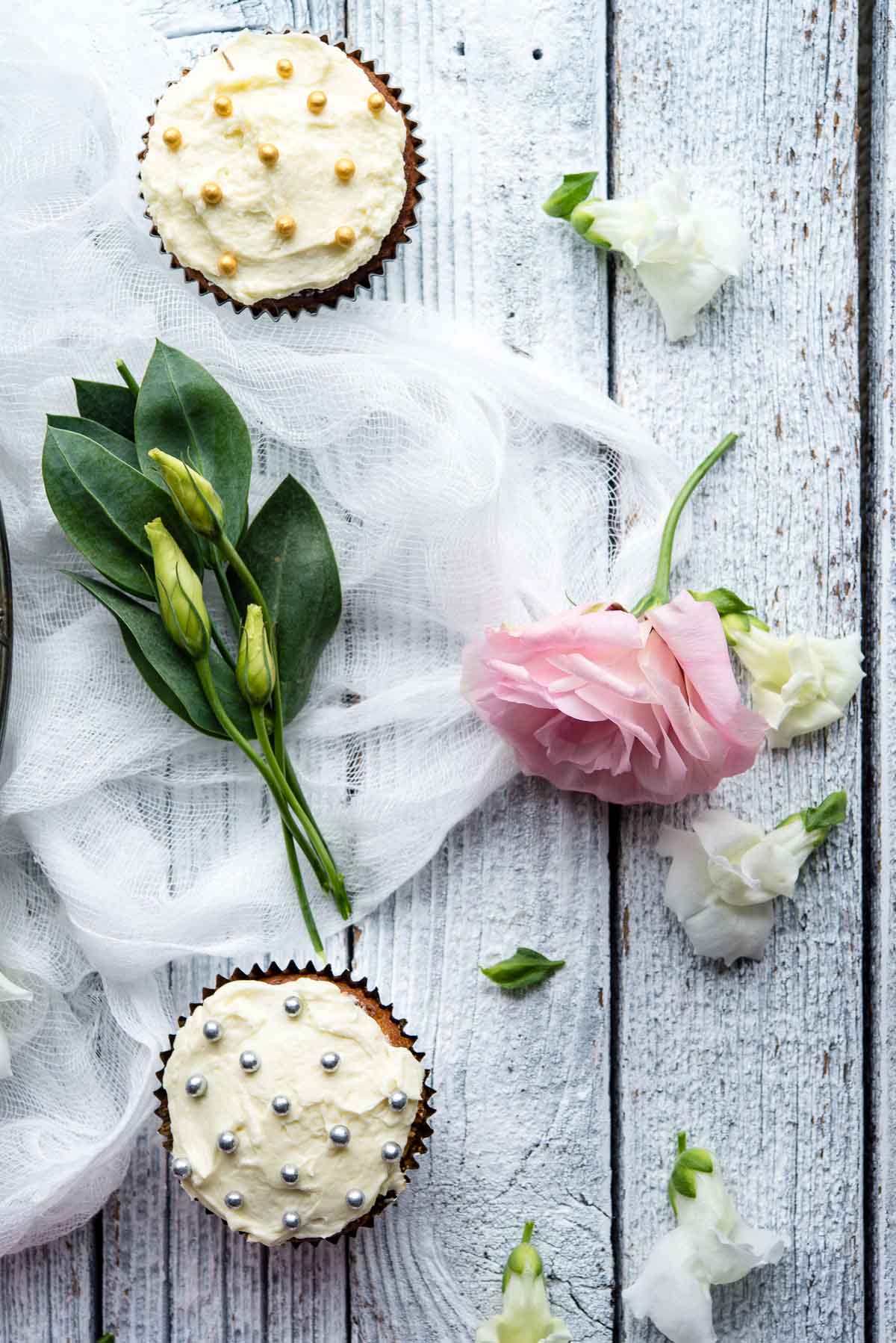 white chocolate cupcakes and flowers