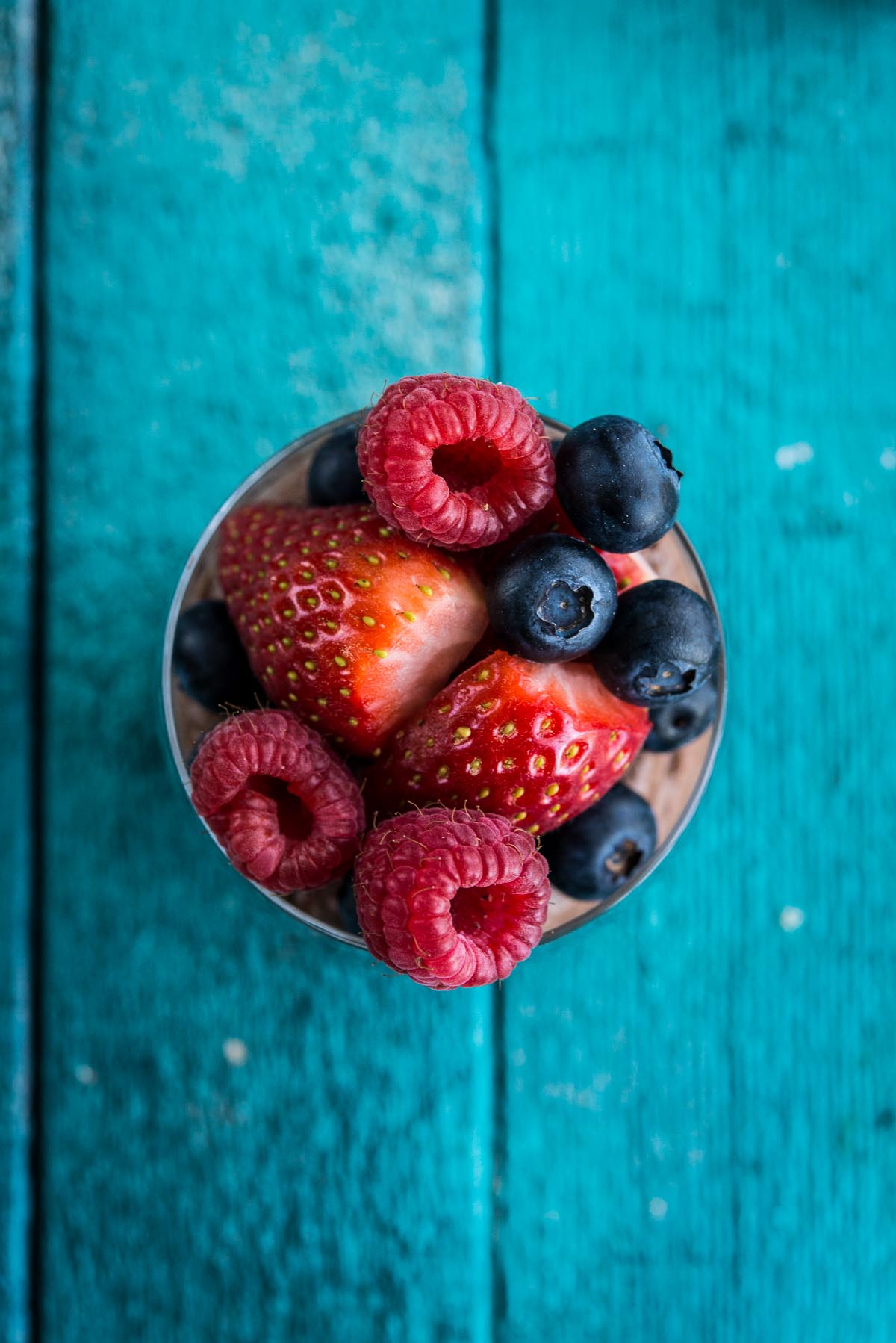 berries on chocolate mousse